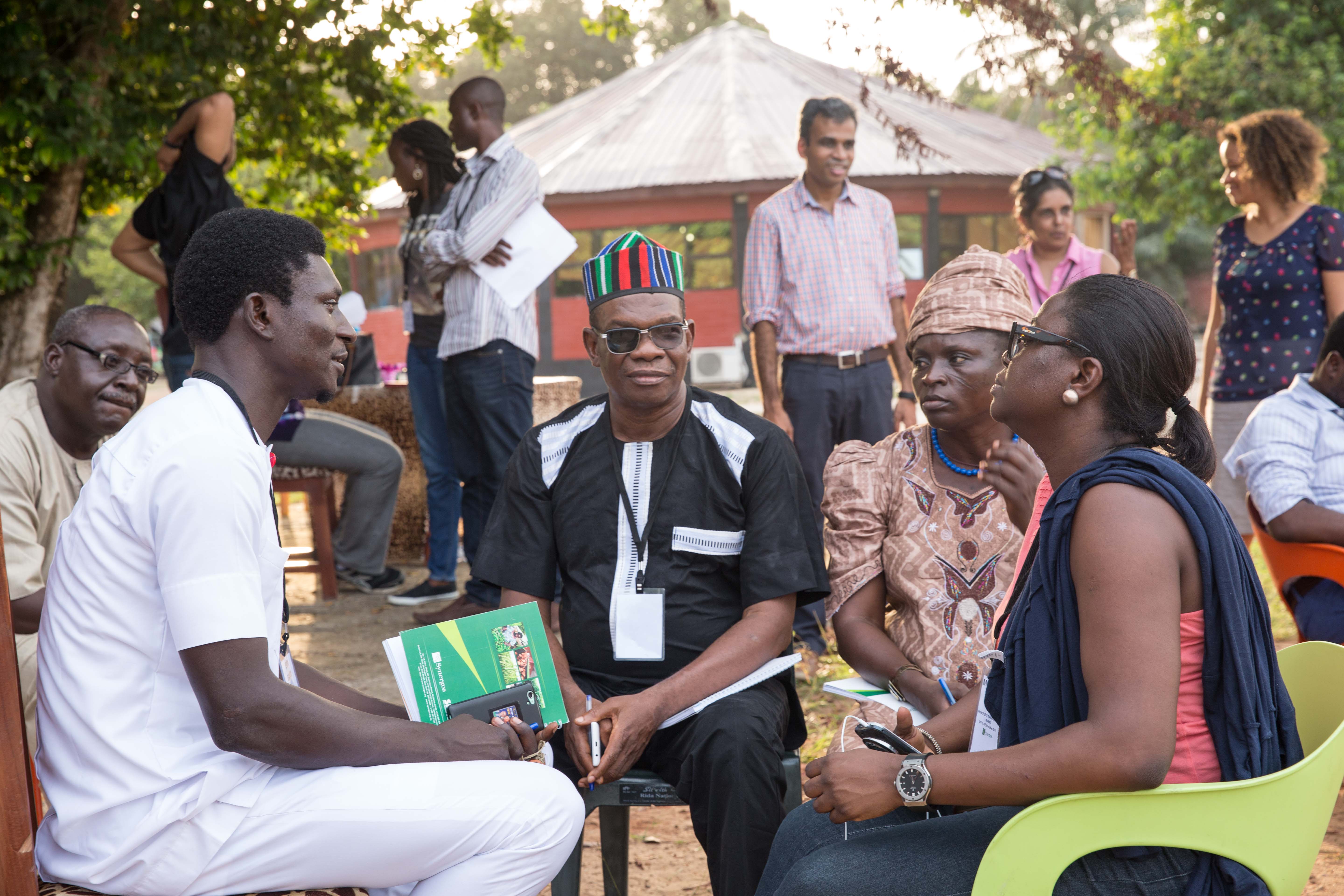 Government officials, farmers, private sector representatives, and community organization members meet during the Principles of Transformation workshop in 2016.