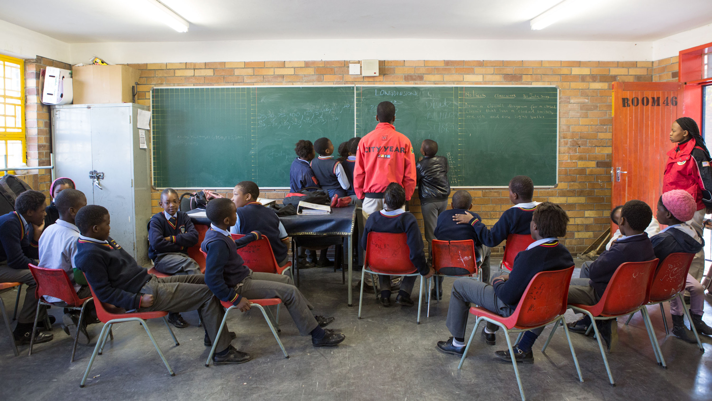 City Year volunteers in classroom