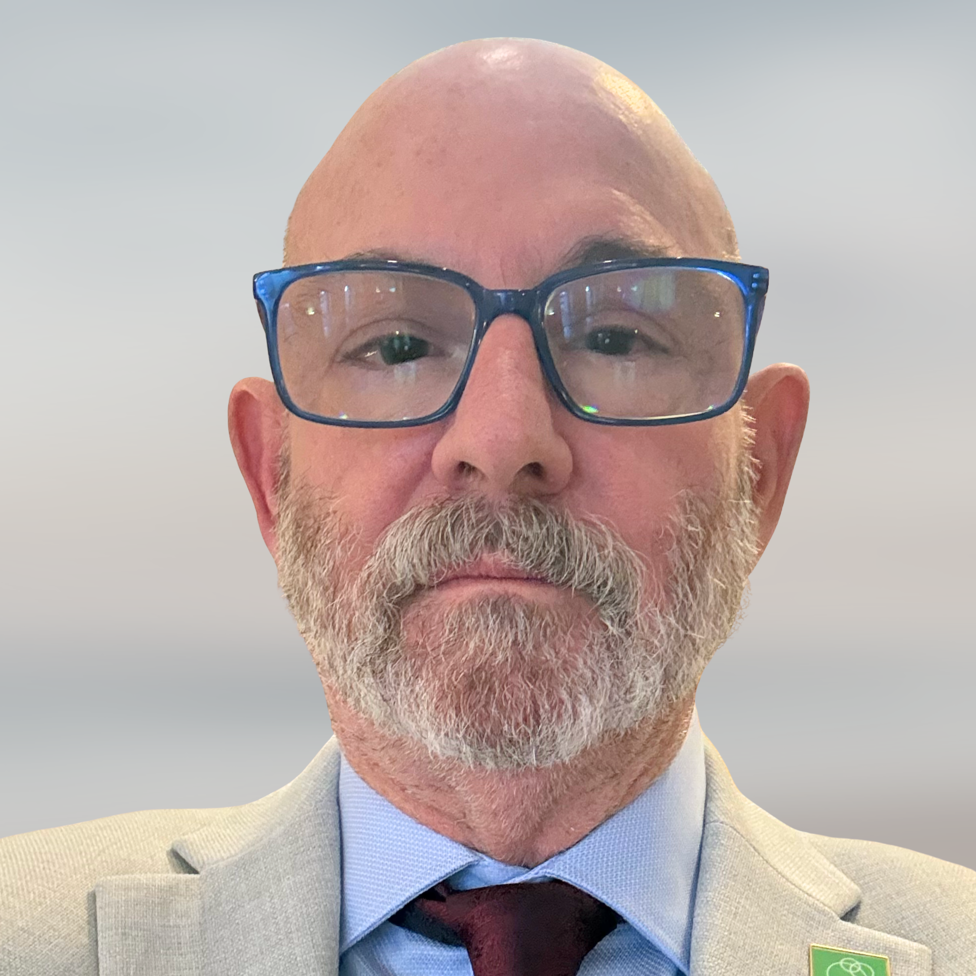 photo of man with blue glasses and beard