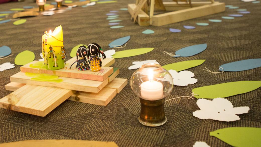 Candles, blocks and dolls representing hope for the children's sector in South Africa