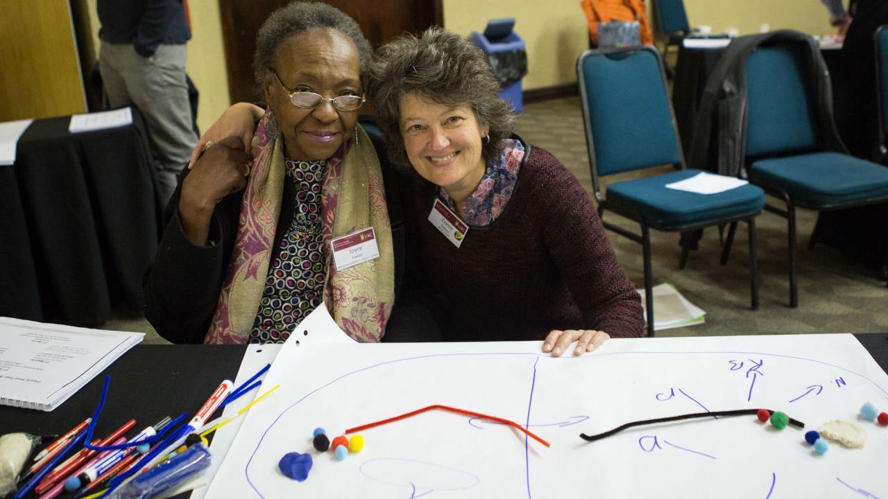 Two LINC Fellows at the network's 2014 annual meeting