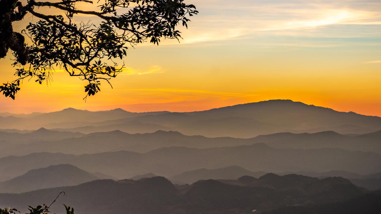 Sunrise over misty mountains in Chiangmai, Thailand